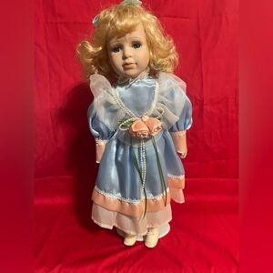 Collectable porcelain doll, likely from the 1980s or 1990s-no mark -with stand